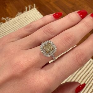 1.28 carat cushion cut yellow diamond engagement ring